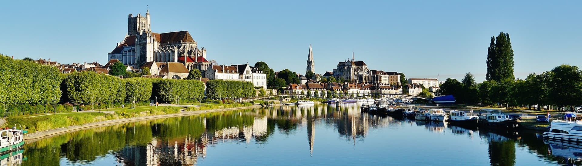 Auxerre skyline and Saint-Étienne Cathedral reflected in the Yonne river