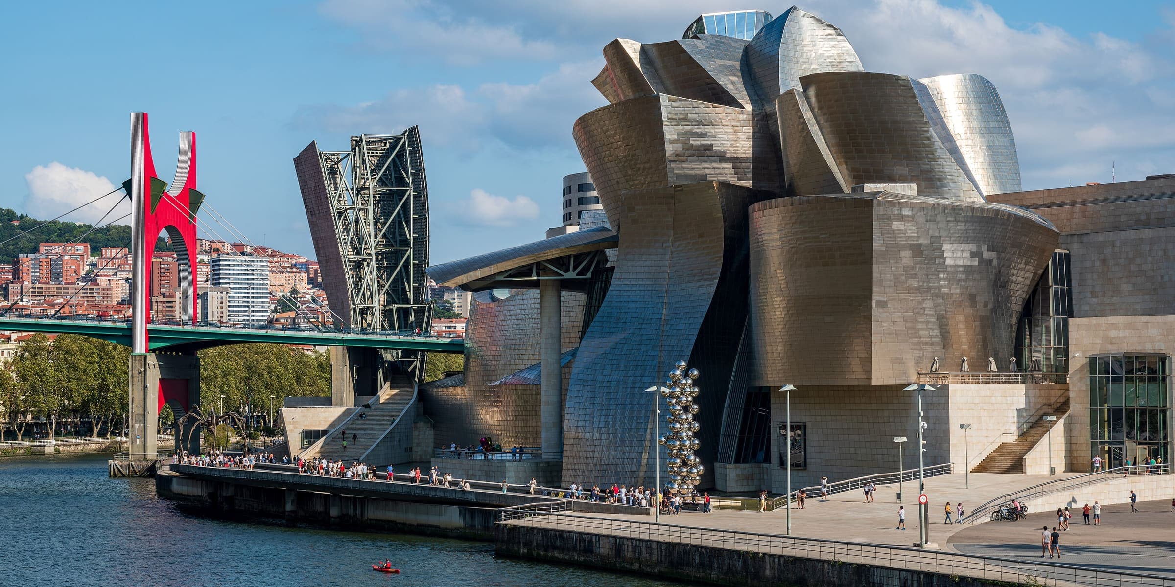 The titanium curves of the Guggenheim Museum on the river in Bilbao