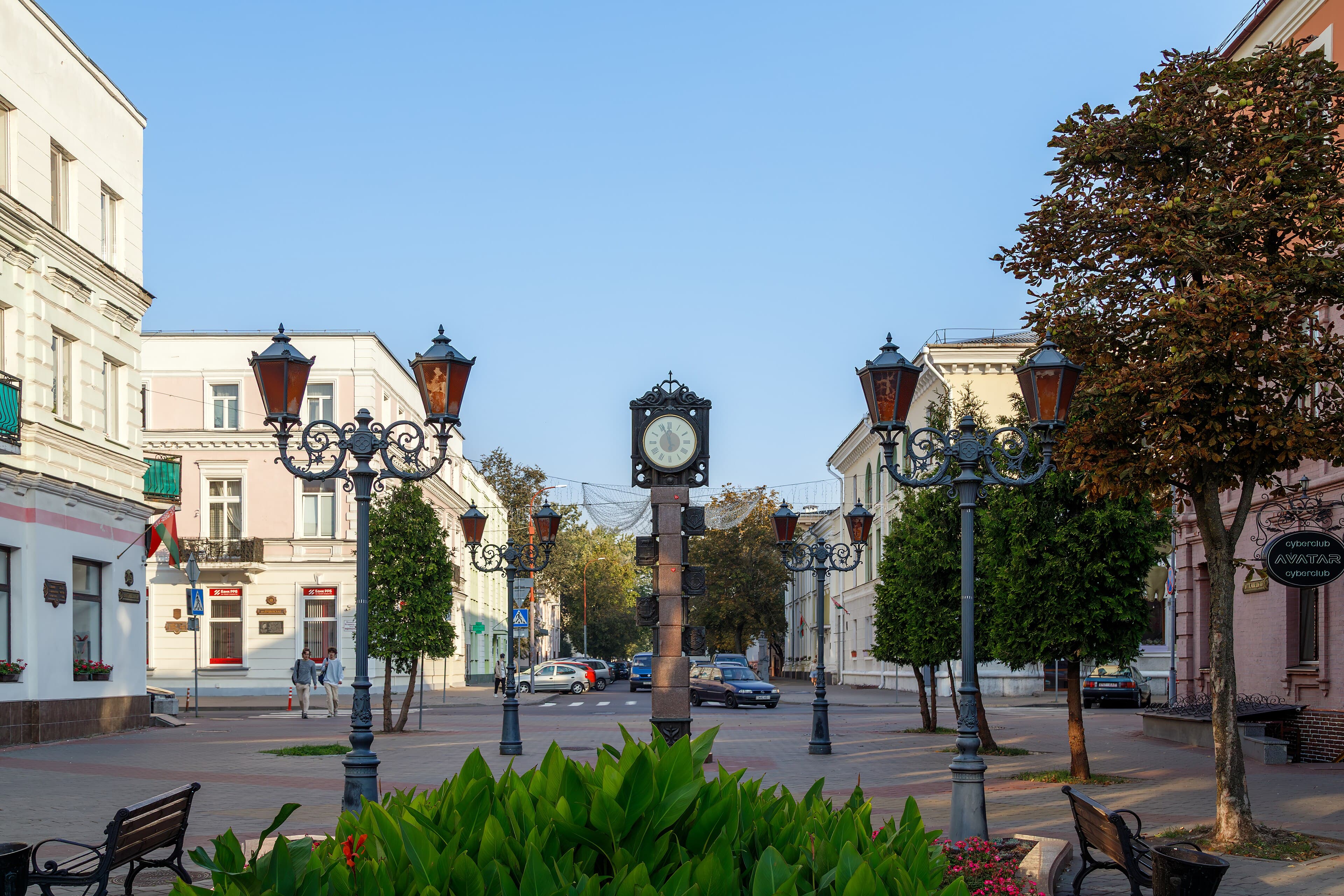 Historic clock and pedestrian Sovetskaya Street in Brest