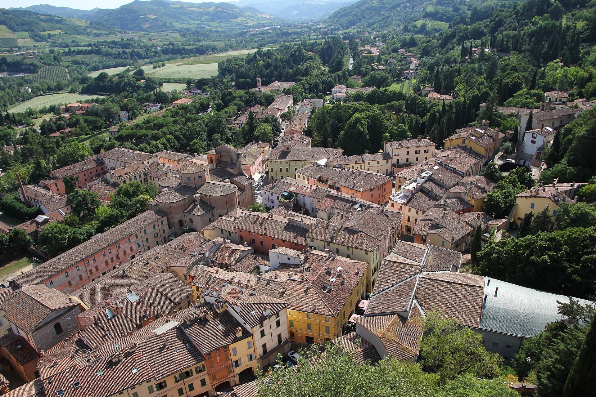 Brisighella's rooftops and the Lamone valley seen from above