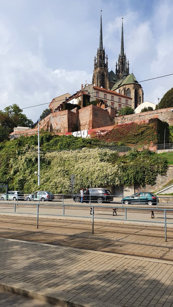 The twin Gothic spires of the Cathedral of St Peter and Paul dominating the skyline of Brno
