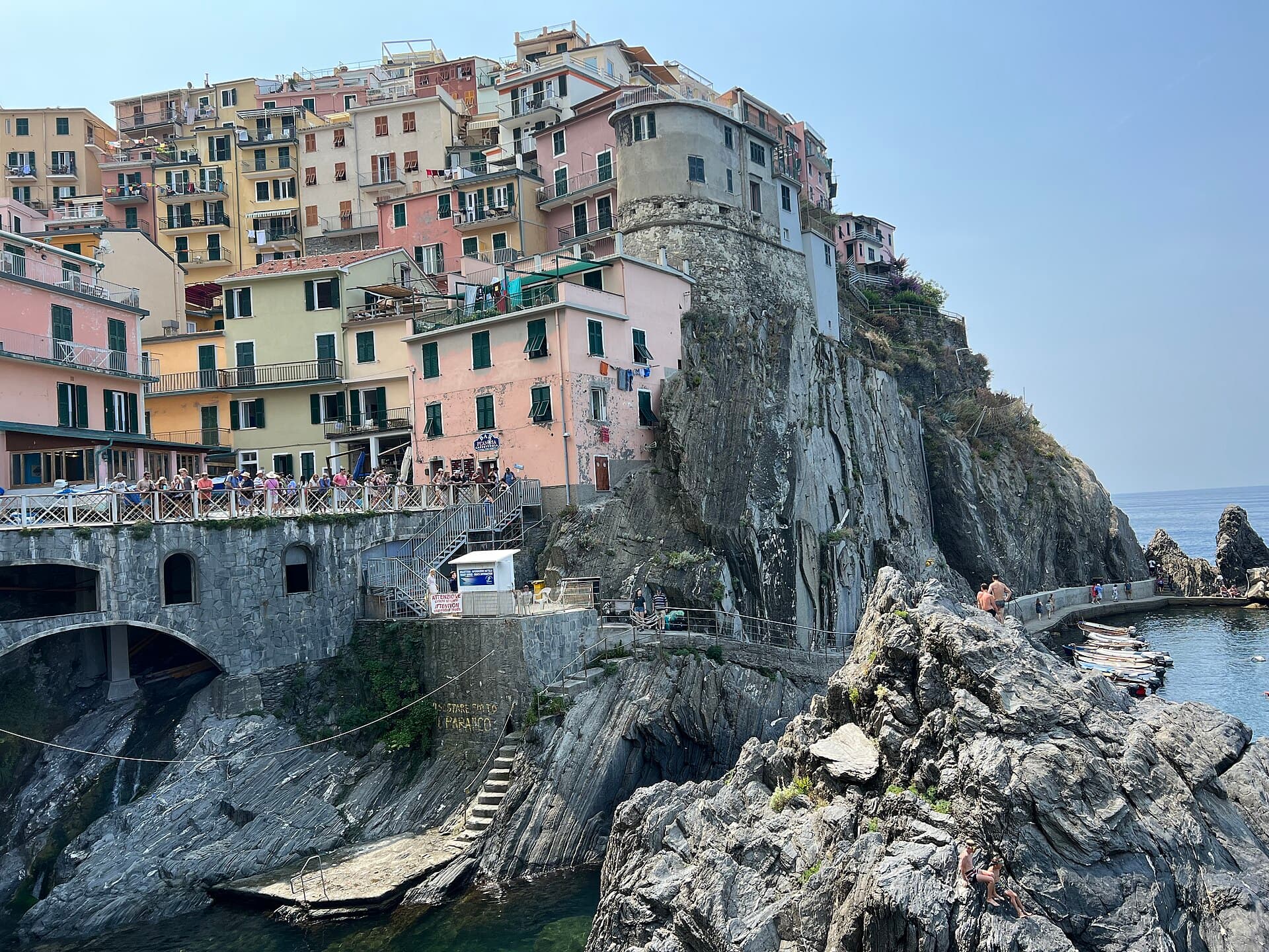 Pastel houses of Manarola clustered on coastal cliffs in Cinque Terre