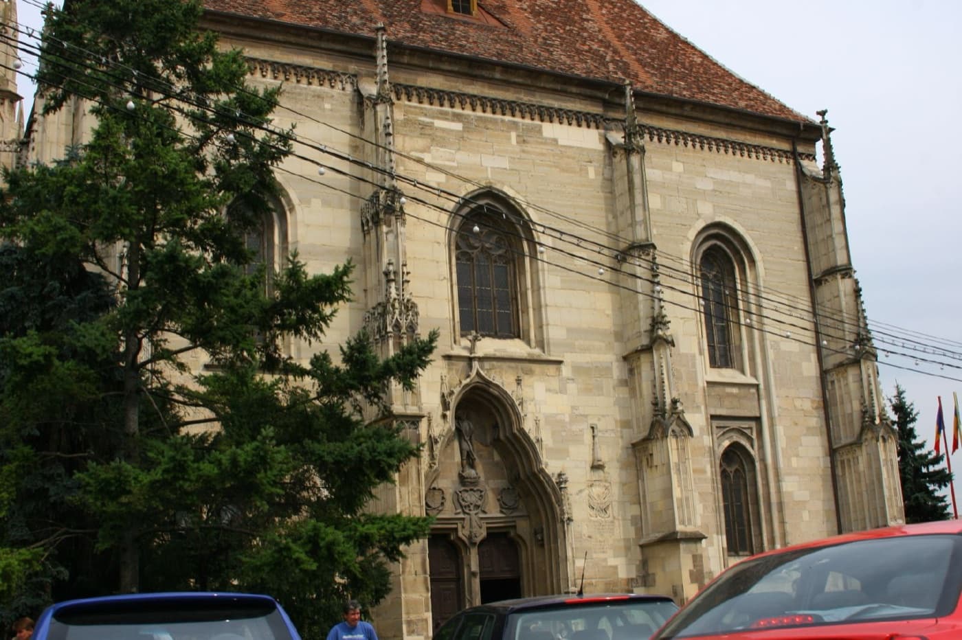 The soaring Gothic spire of St. Michael's Church dominating Piața Unirii in Cluj-Napoca