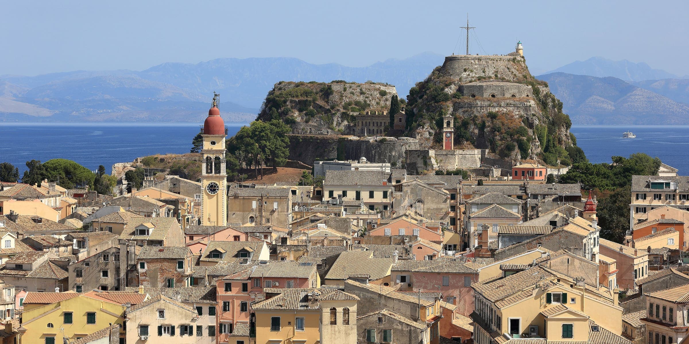 Corfu's old town and bell tower below the Old Fortress on its headland