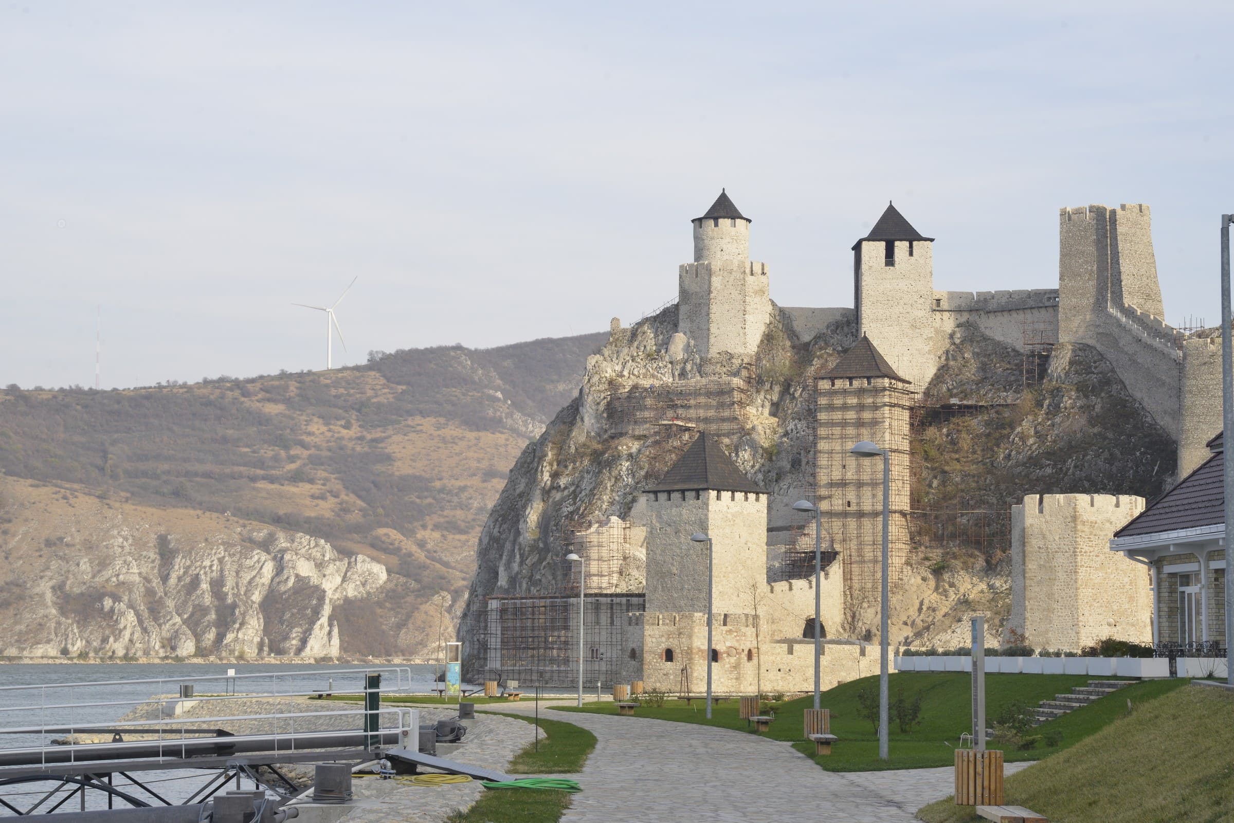 The stone towers and battlements of medieval Golubac Fortress guarding the Danube river at the entrance to Đerdap Gorge