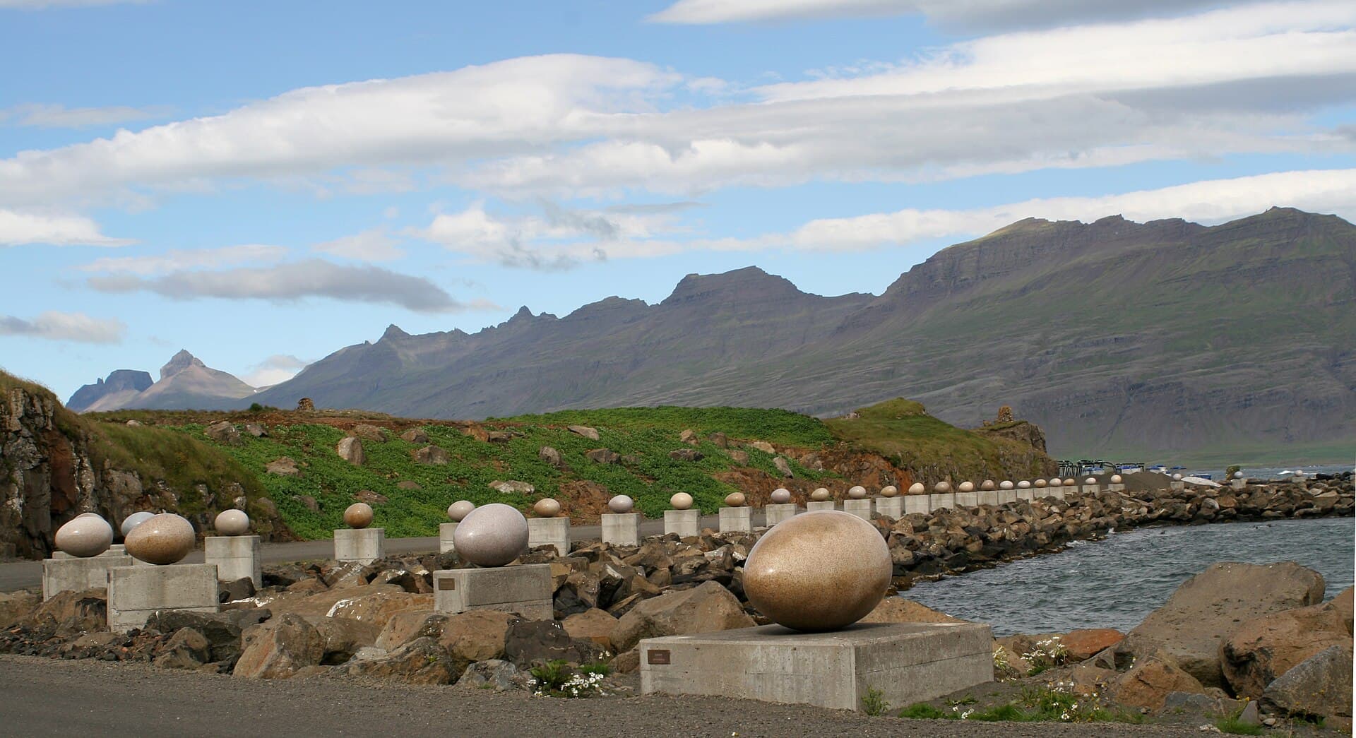 The giant granite egg sculptures of Eggin í Gleðivík along the coastline of Djúpivogur in the Eastfjords
