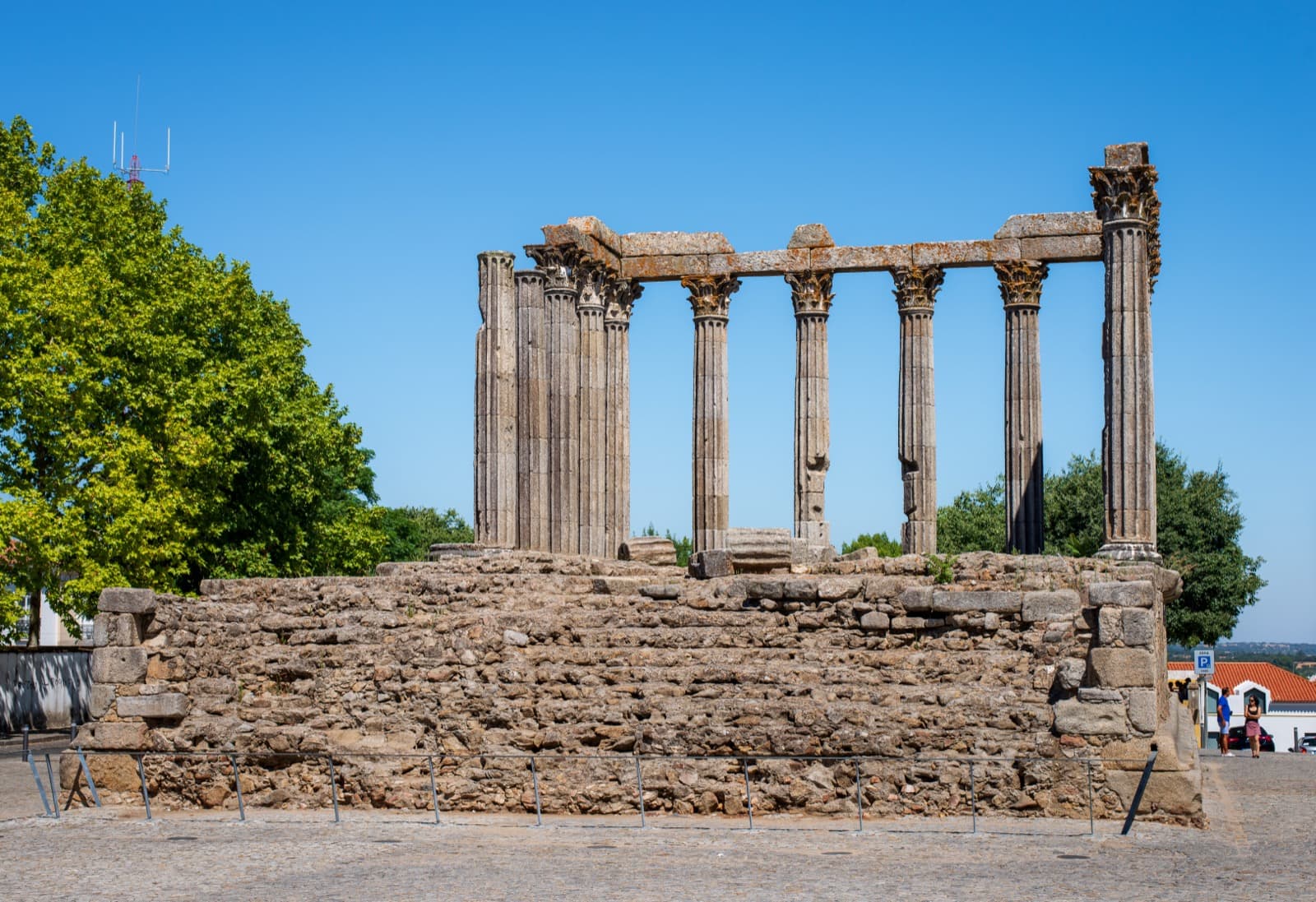 Slender Corinthian columns of the Roman Temple of Diana standing in central Évora