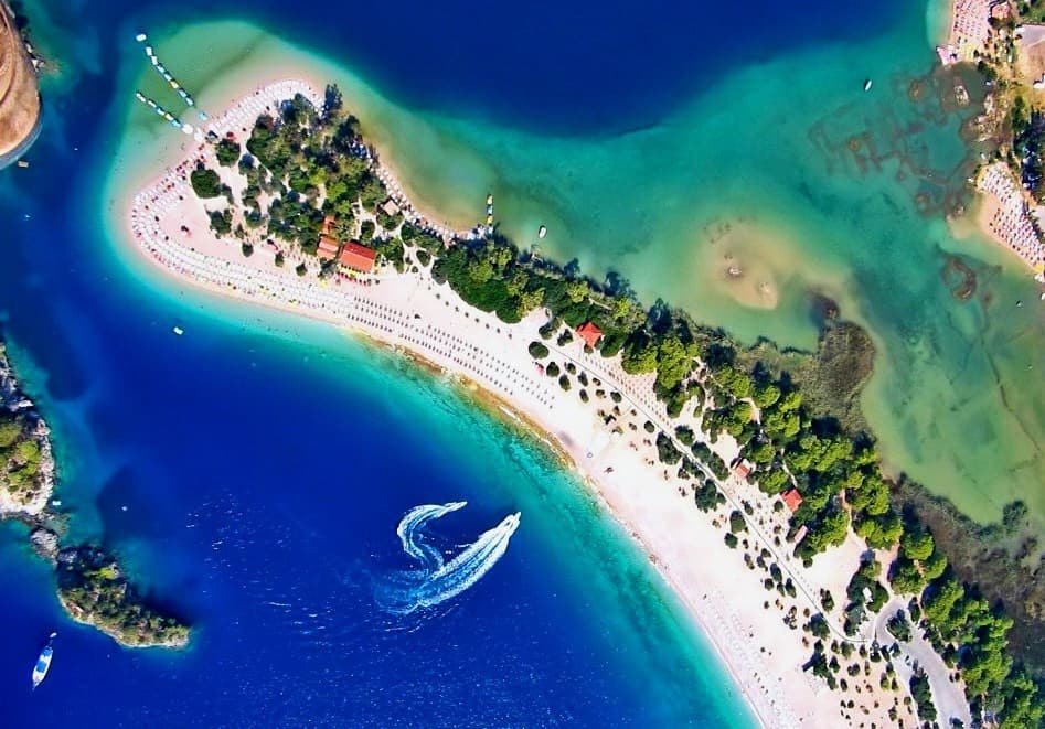 Turquoise waters of the Blue Lagoon and sand spit in Ölüdeniz near Babadağ