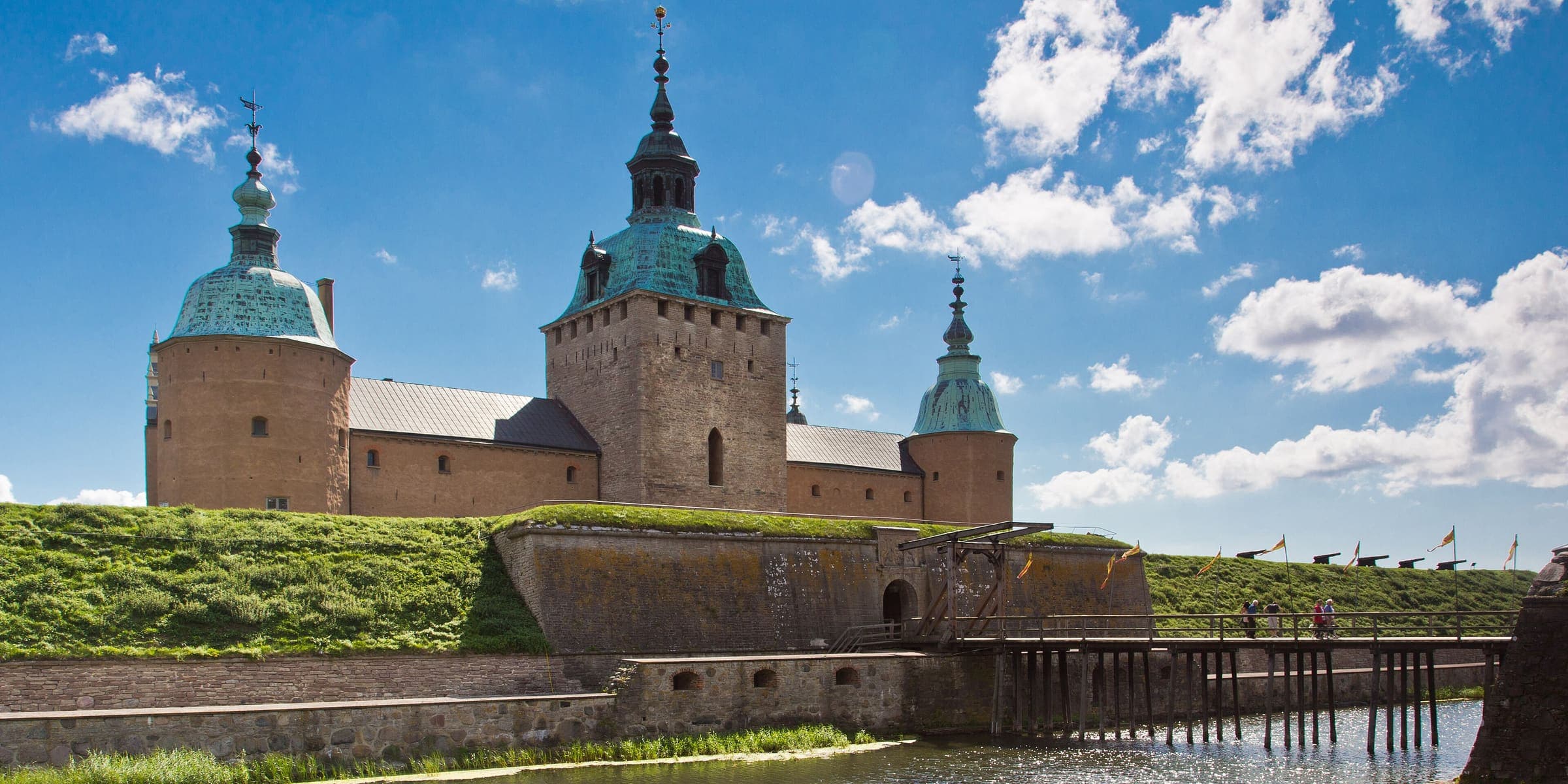 Kalmar Castle's copper-roofed towers above its moat and ramparts