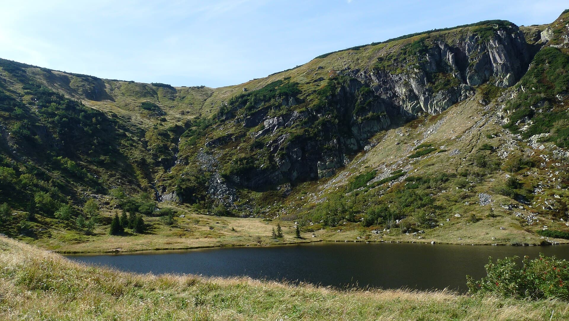 The rugged granite crest of Śnieżka and mountain valleys in Karkonosze National Park