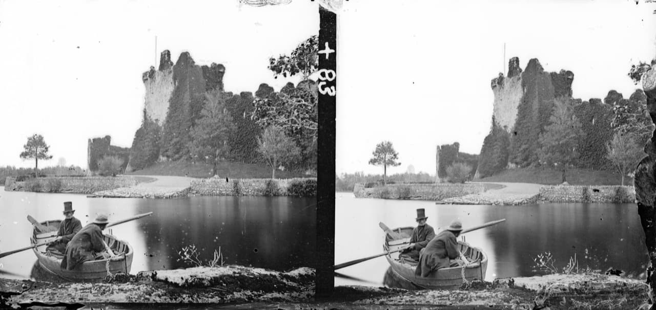 Ross Castle perched at the water's edge of Lough Leane in Killarney National Park