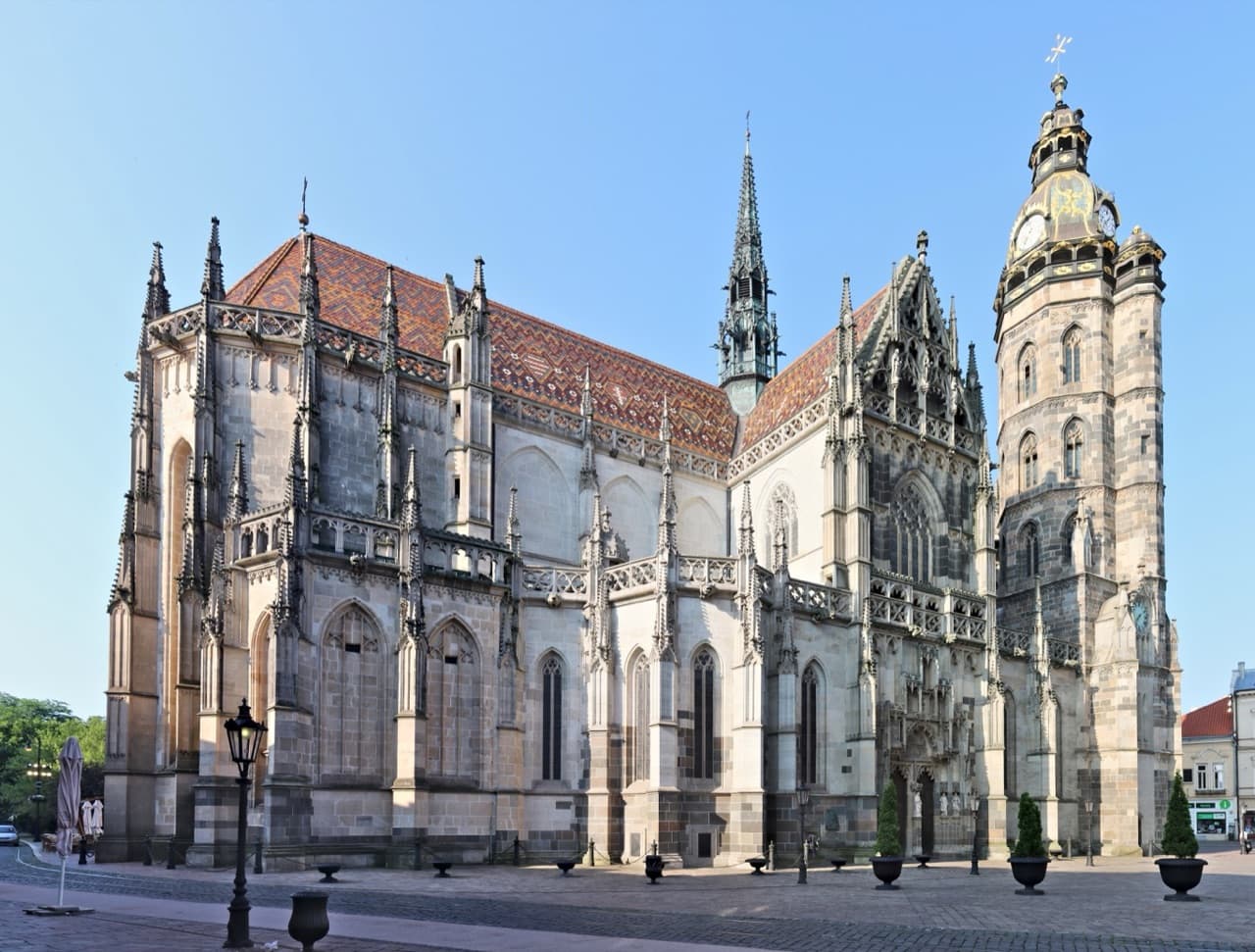 The grand Gothic facade and spire of St. Elisabeth Cathedral on Hlavná Street in Košice