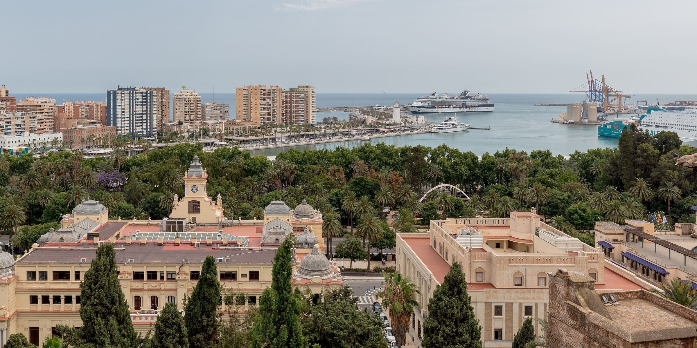 Málaga's old town, the bullring and the port seen from the Alcazaba