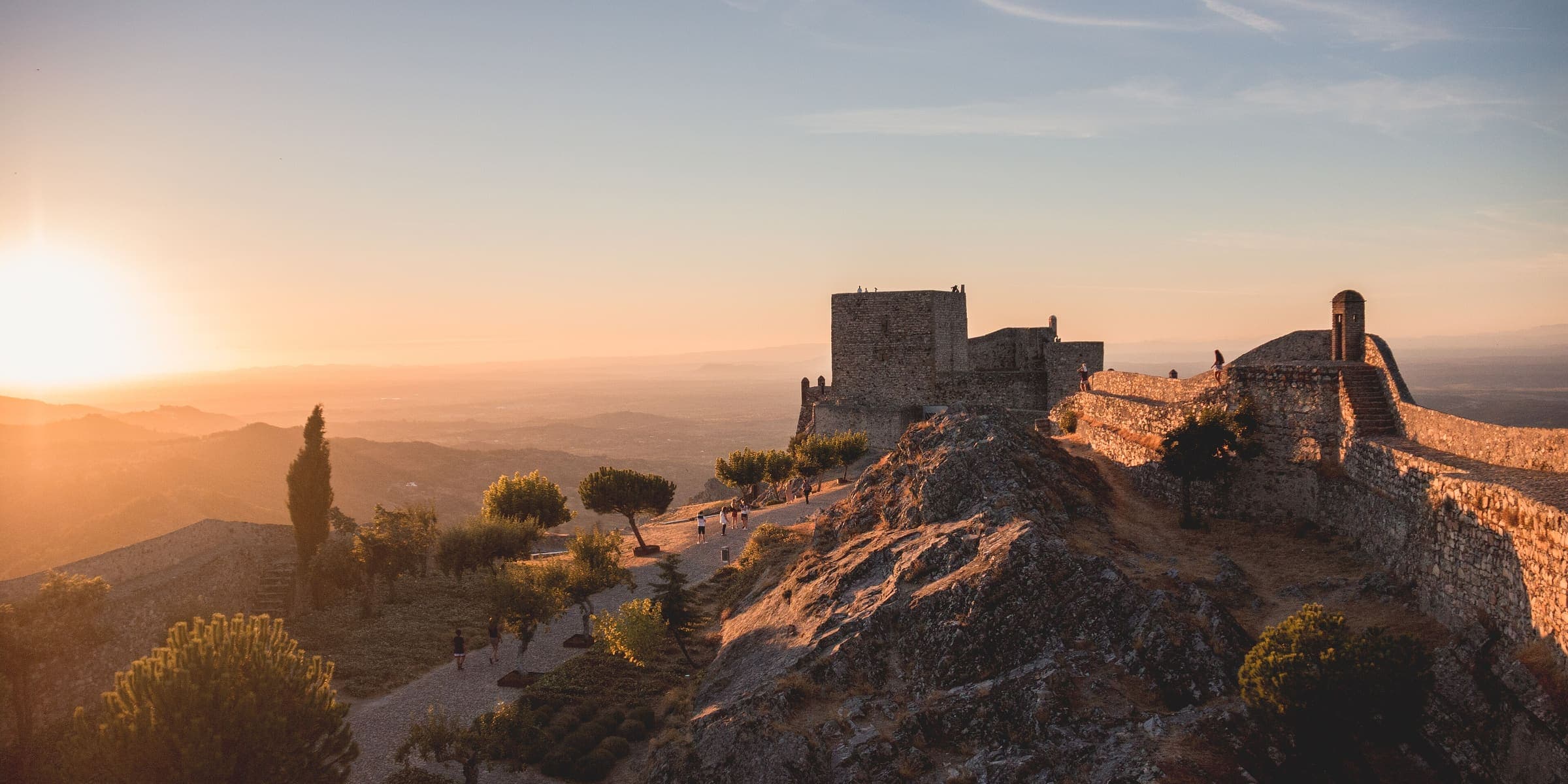 Marvão's castle on its granite crag at sunset