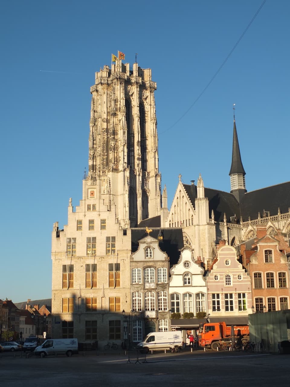 The imposing flat-topped 97-metre tower of St Rumbold's Cathedral soaring over the Grote Markt in Mechelen
