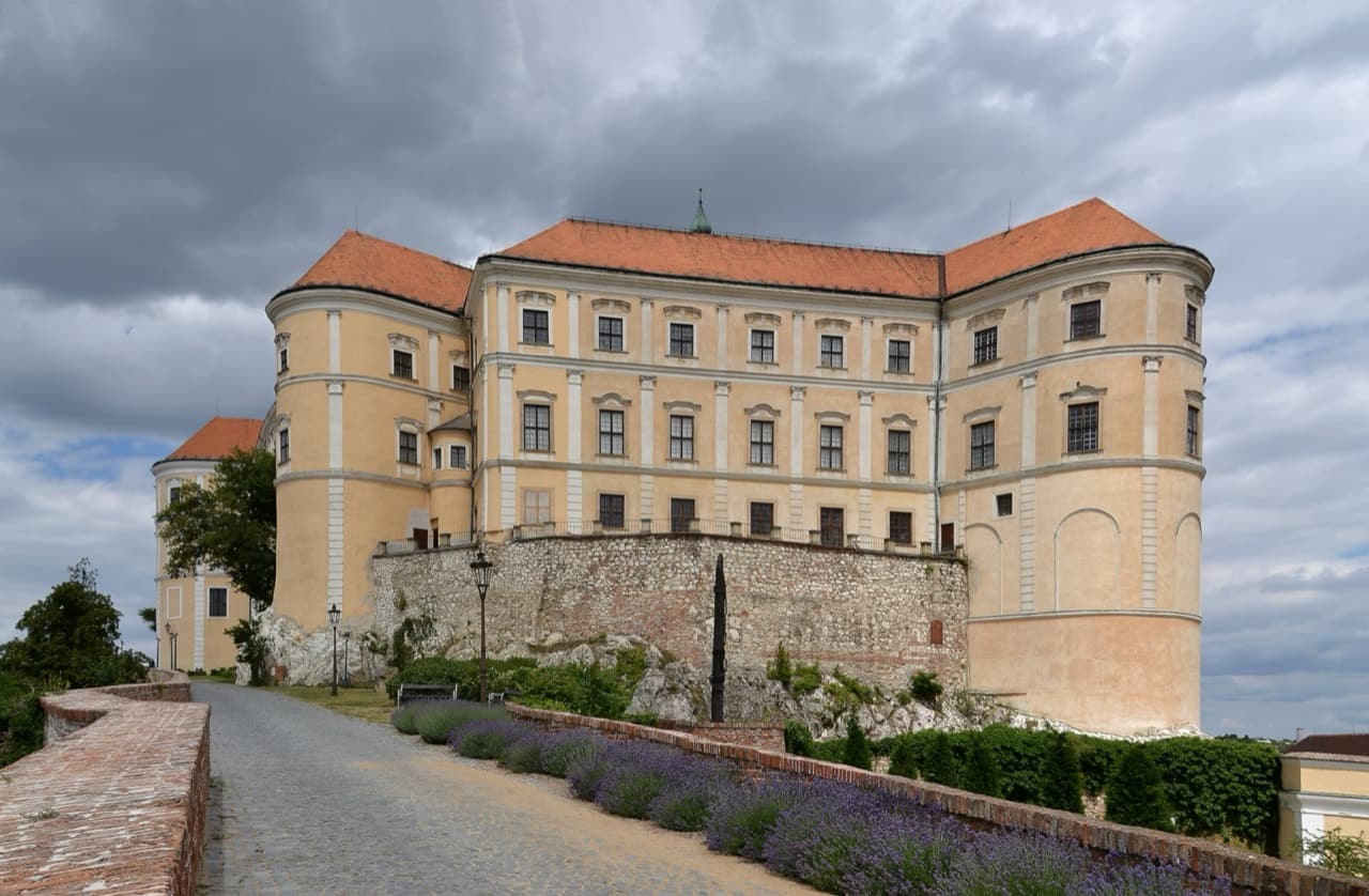 The grand Baroque chateau of Mikulov crowning a rocky hill surrounded by Moravian vineyards