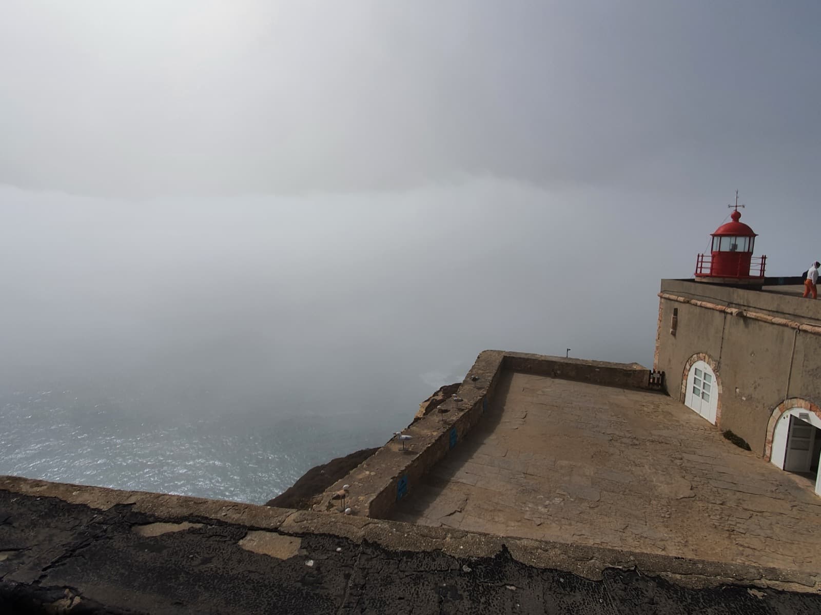 Forte de São Miguel Arcanjo perched on the promontory above the giant wave surf in Nazaré