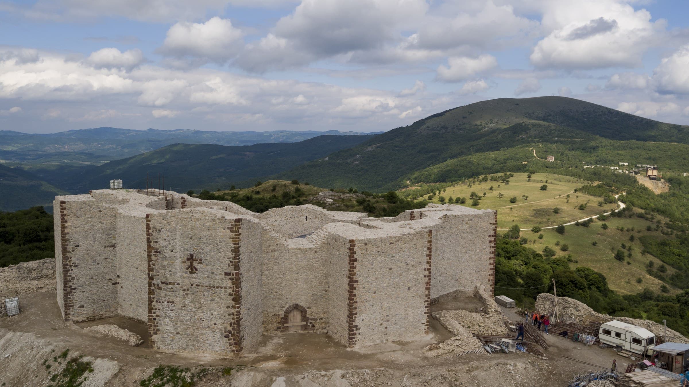 Broken stone keep and curtain walls of Novo Brdo fortress on its bare hilltop