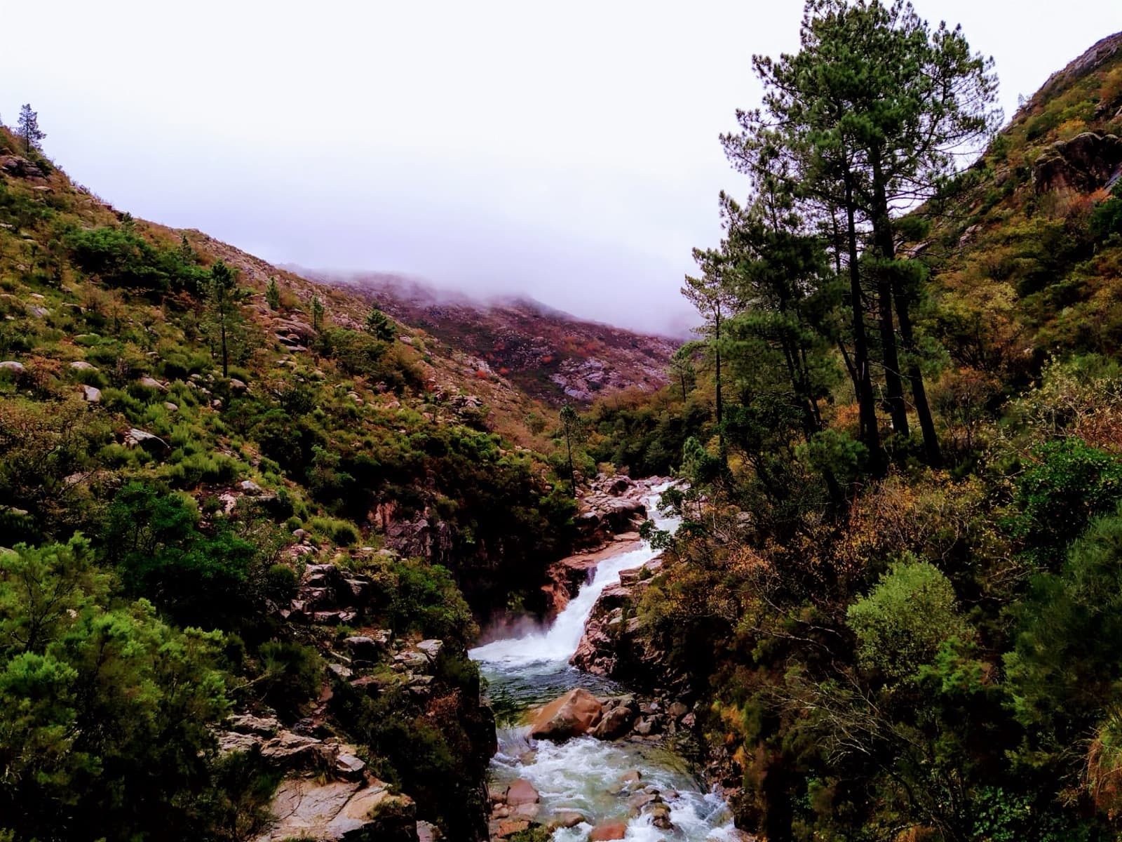 Granite mountain ridges and deep forested river valleys of Peneda-Gerês National Park
