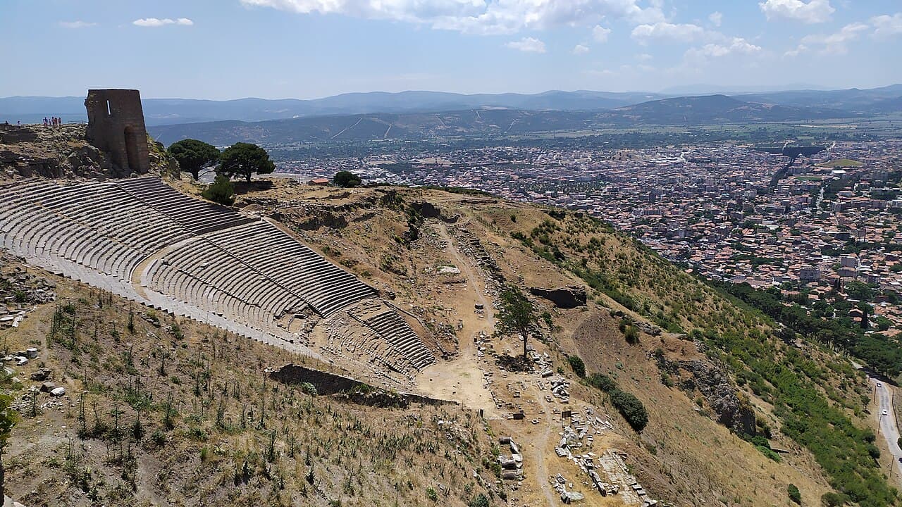 Steep hillside Hellenistic theatre and temple ruins of the Acropolis of Pergamon overlooking the Bakırçay valley