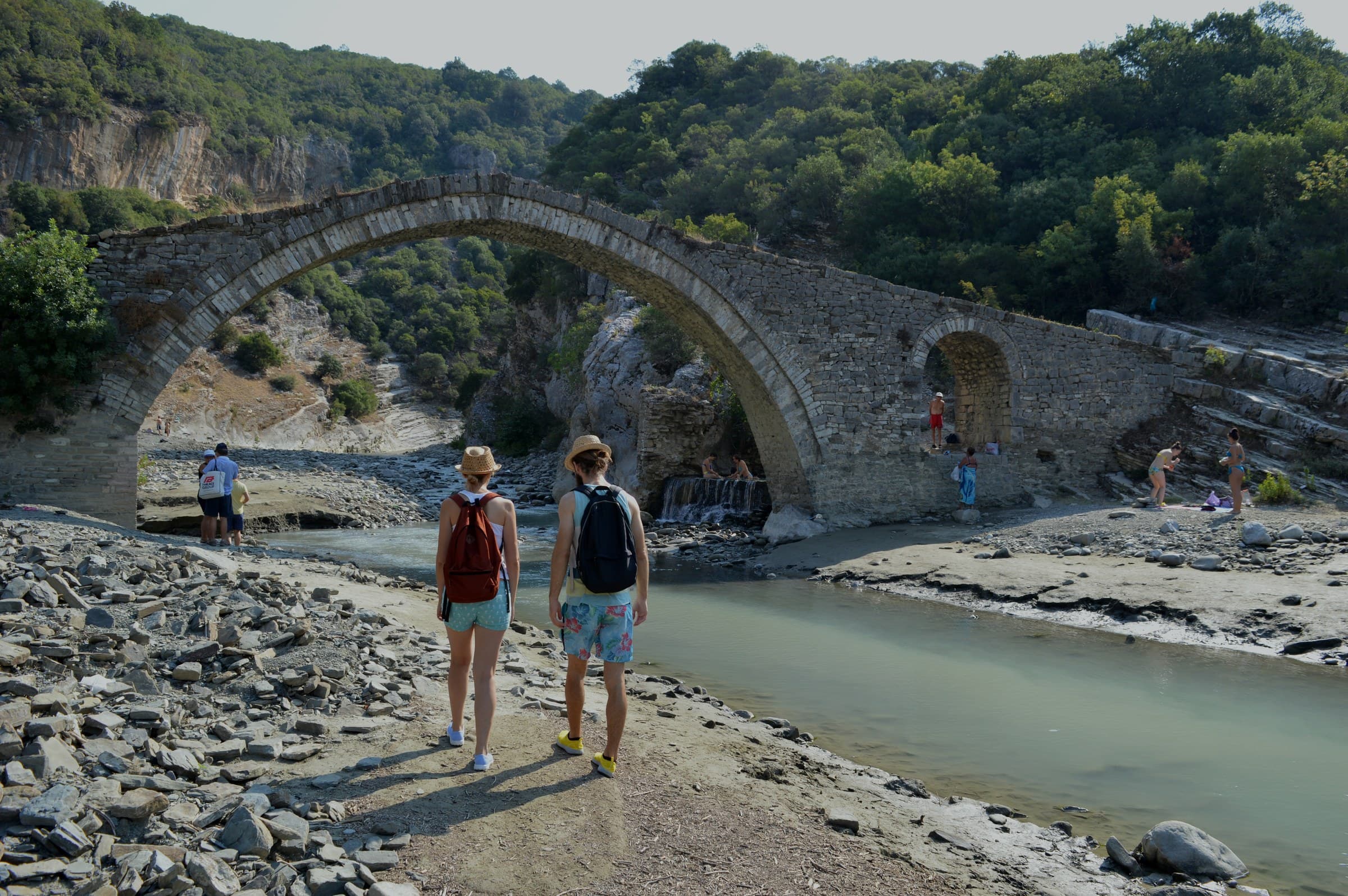 Arched stone Ottoman bridge of Ura e Katiut spanning the crystalline Lengarica canyon near Përmet