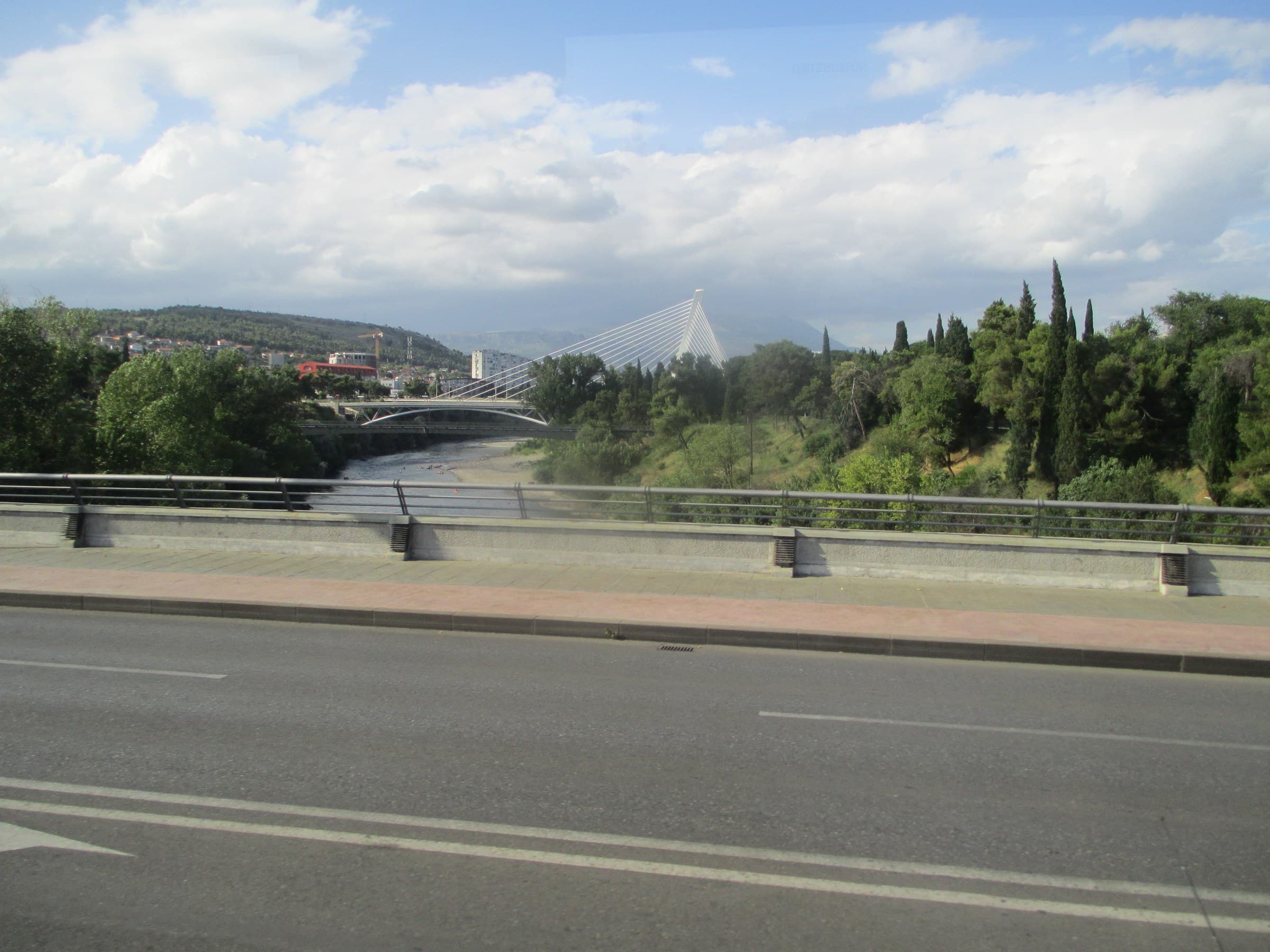 Cable-stayed Millennium Bridge spanning the Morača River in modern Podgorica