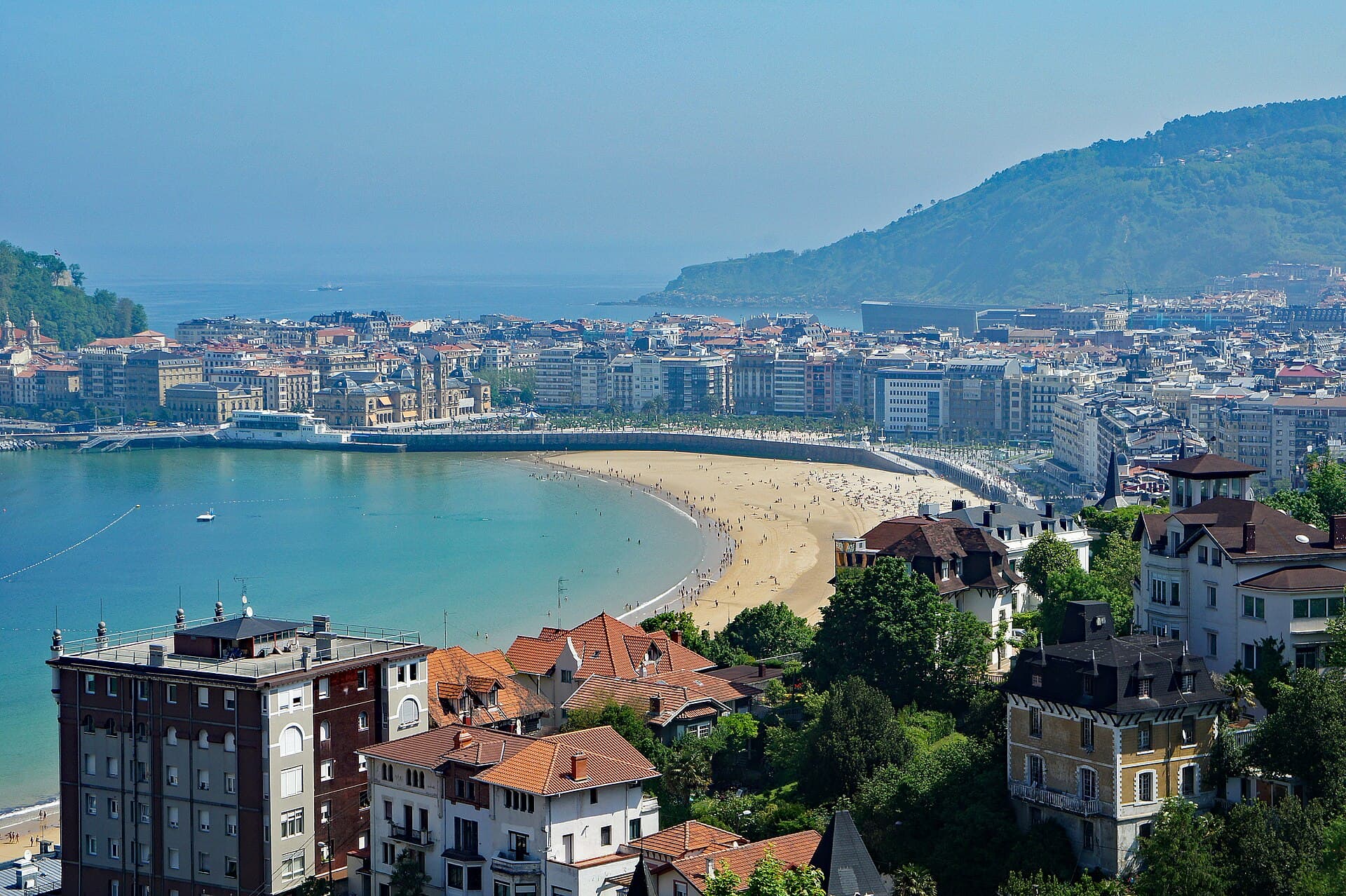 Panoramic view of La Concha bay and beach with Santa Clara Island in San Sebastián