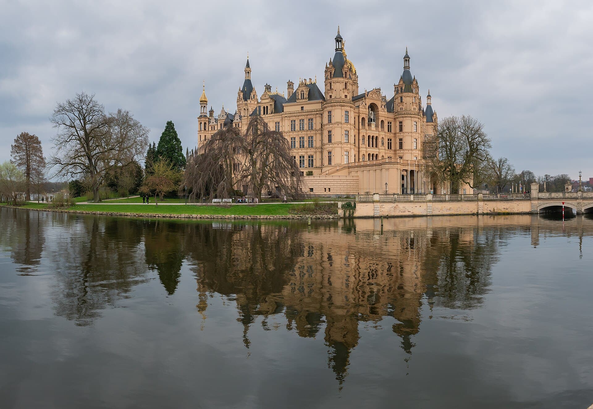 Gilded spires of Schwerin Castle rising from its lake island in northern Germany