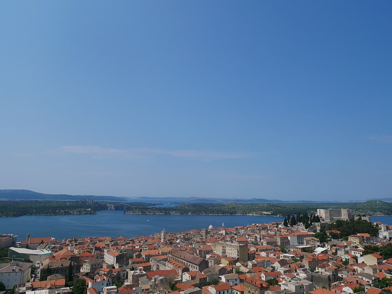 View over the stone roofs and fortress ramparts of Šibenik from Barone Fortress