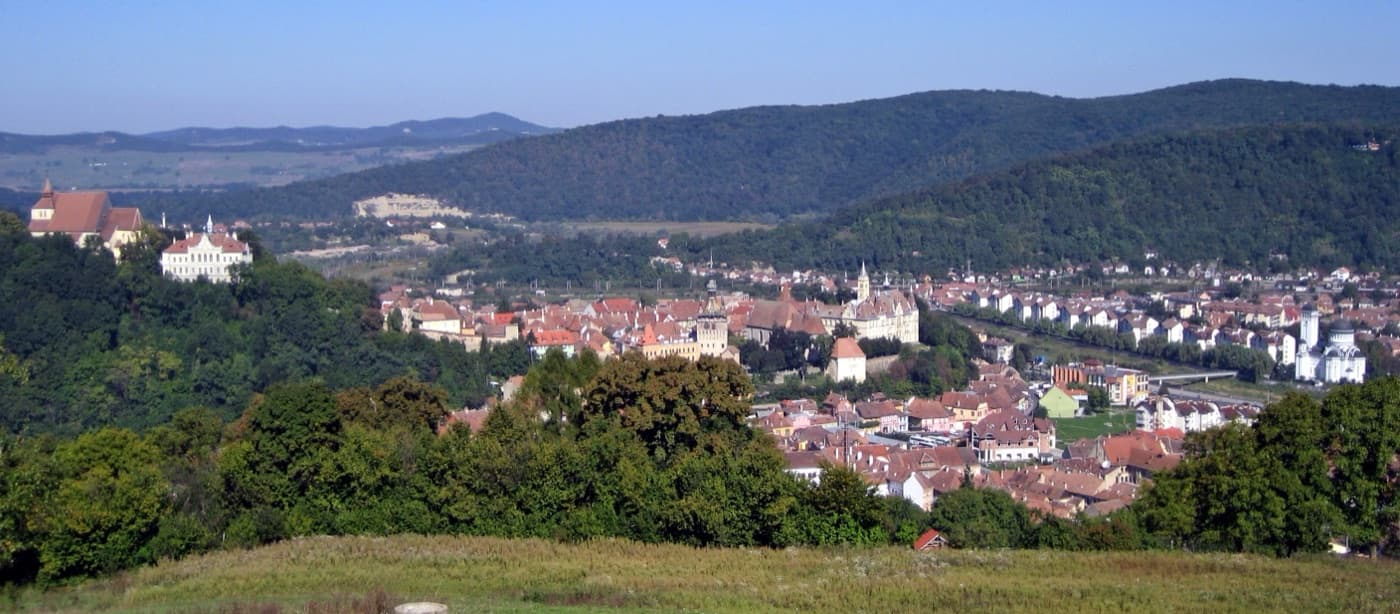 The iconic multi-tiered Clock Tower standing over the medieval hilltop citadel of Sighișoara