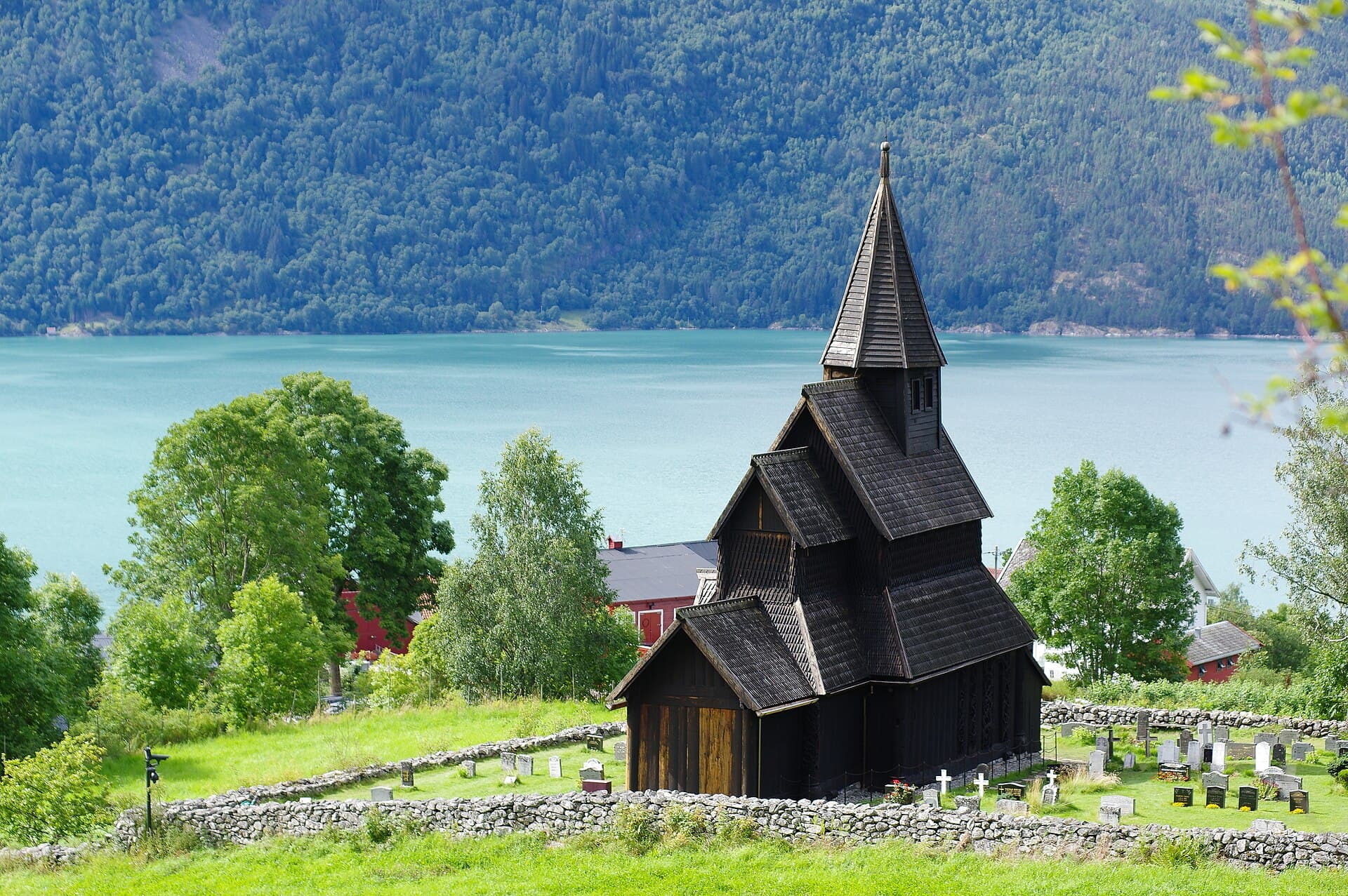 Urnes Stave Church, Norway's oldest stave church, overlooking the Lustrafjord branch of Sognefjord.
