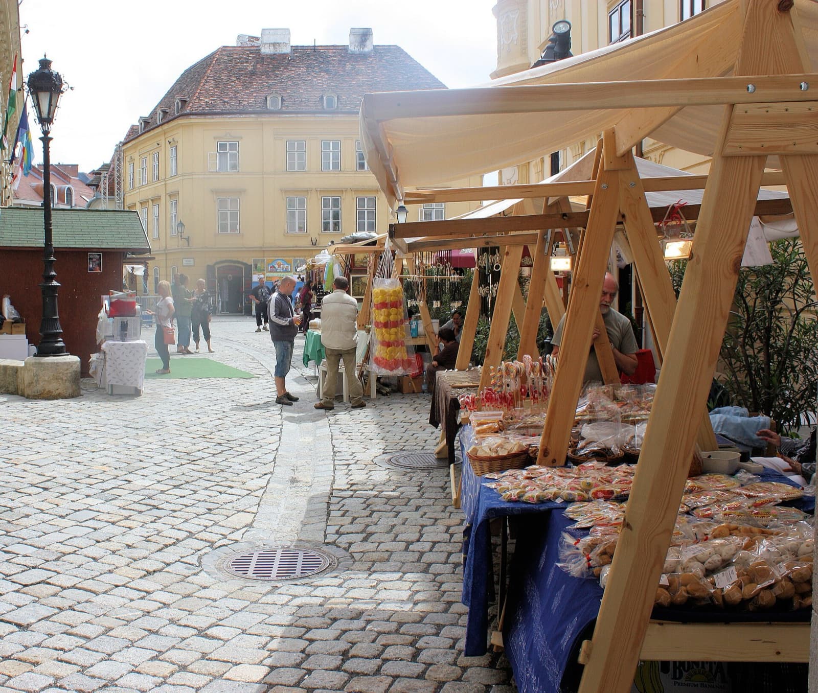 The historic cylindrical stone Firewatch Tower rising above the Renaissance Main Square in Sopron