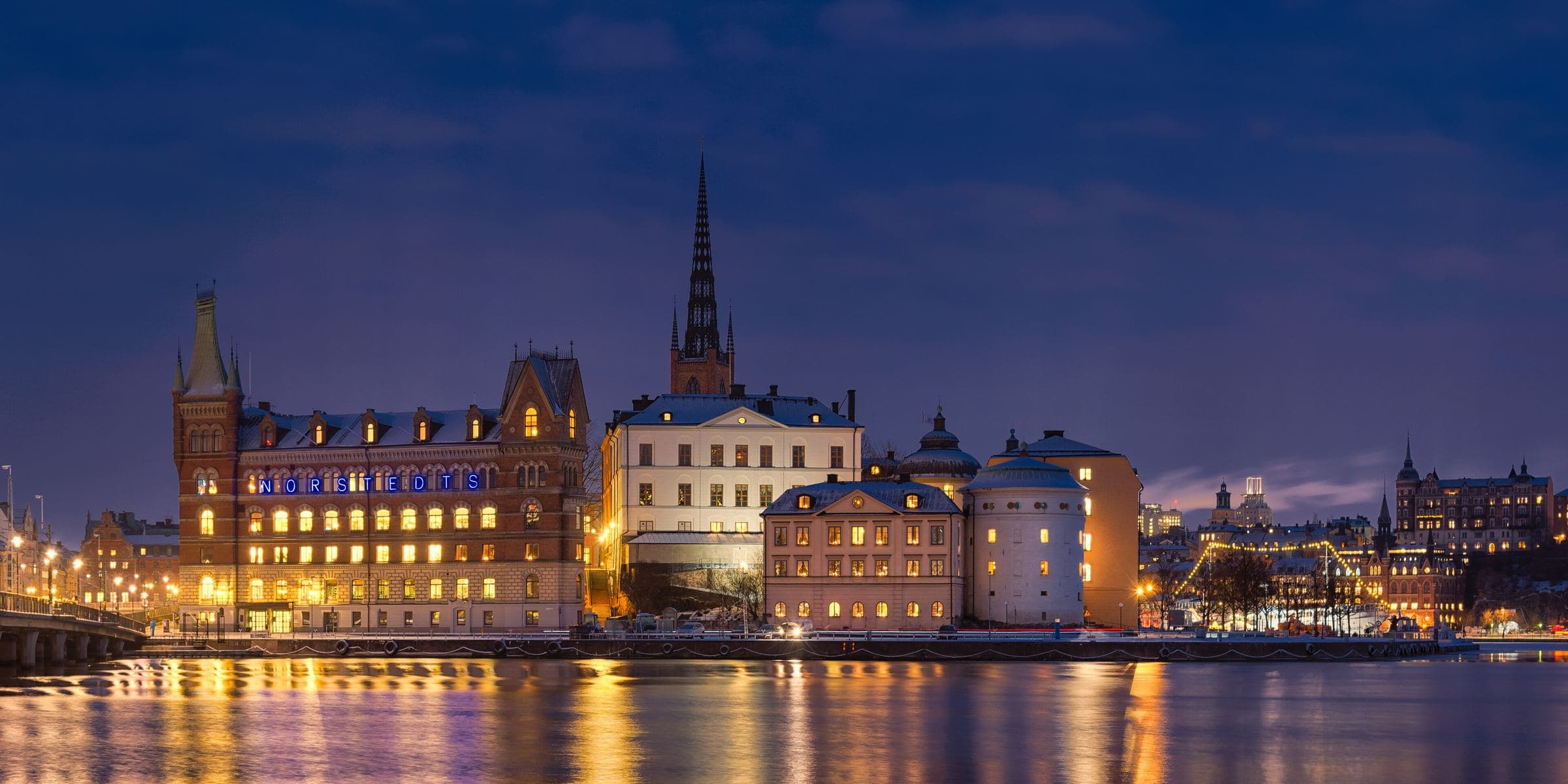 Riddarholmen across the water in Stockholm at dusk