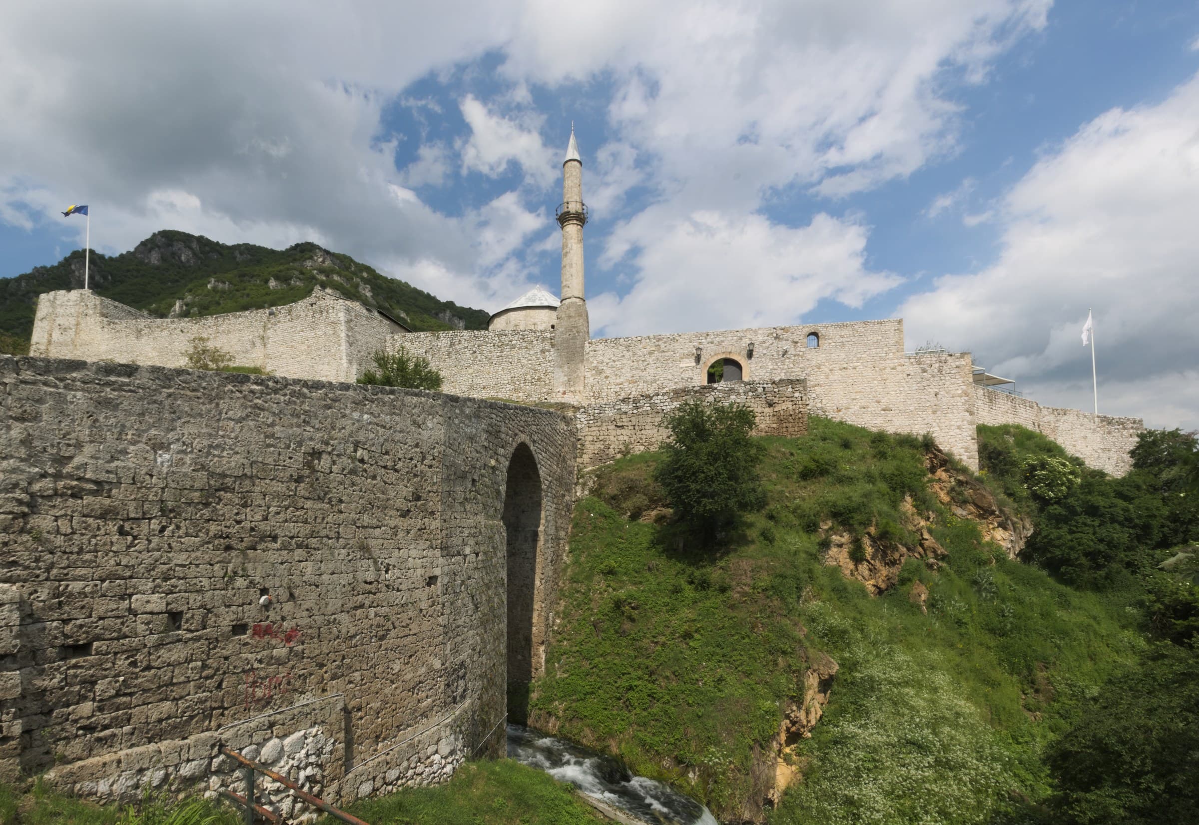 Ancient medieval stone fortress ramparts and round watchtower overlooking Travnik in the Lašva valley