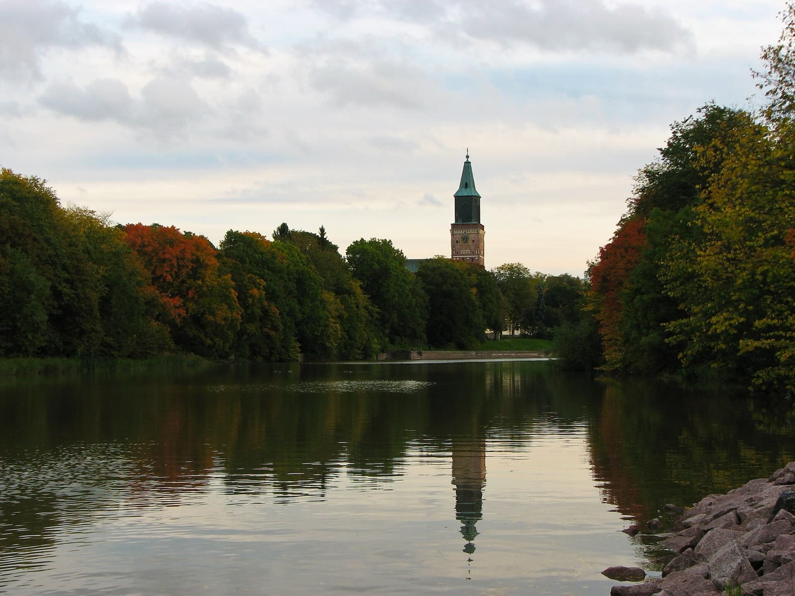 The medieval grey stone towers of Turku Castle guarding the mouth of the Aura River in southwest Finland