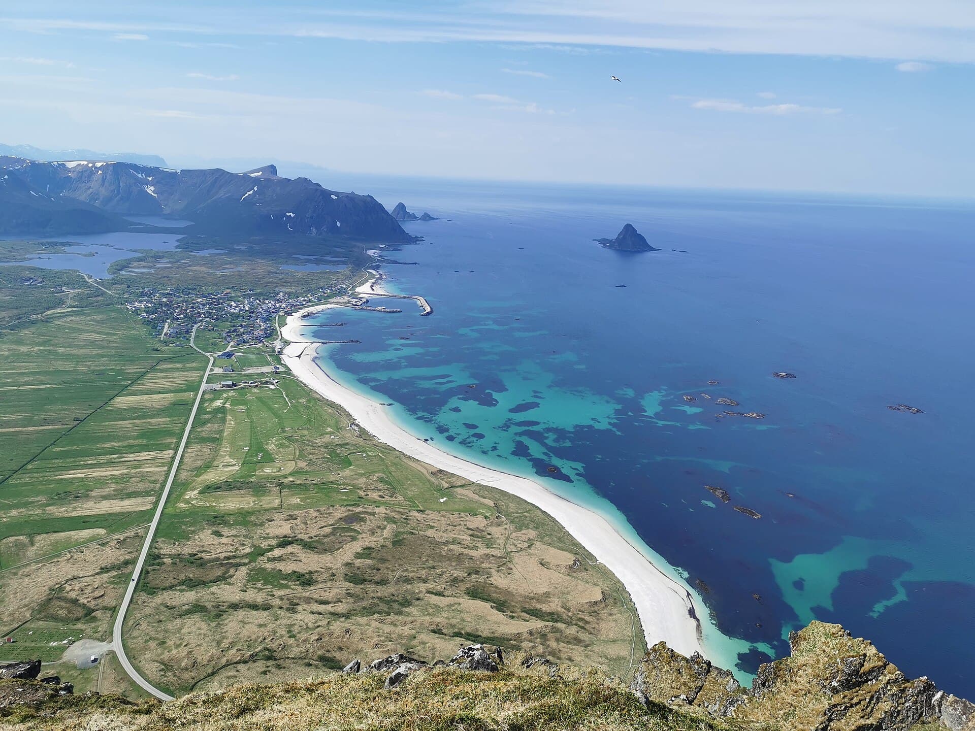 Bleik white coral beach and the pyramid bird island of Bleiksøya on Andøya in Vesterålen.