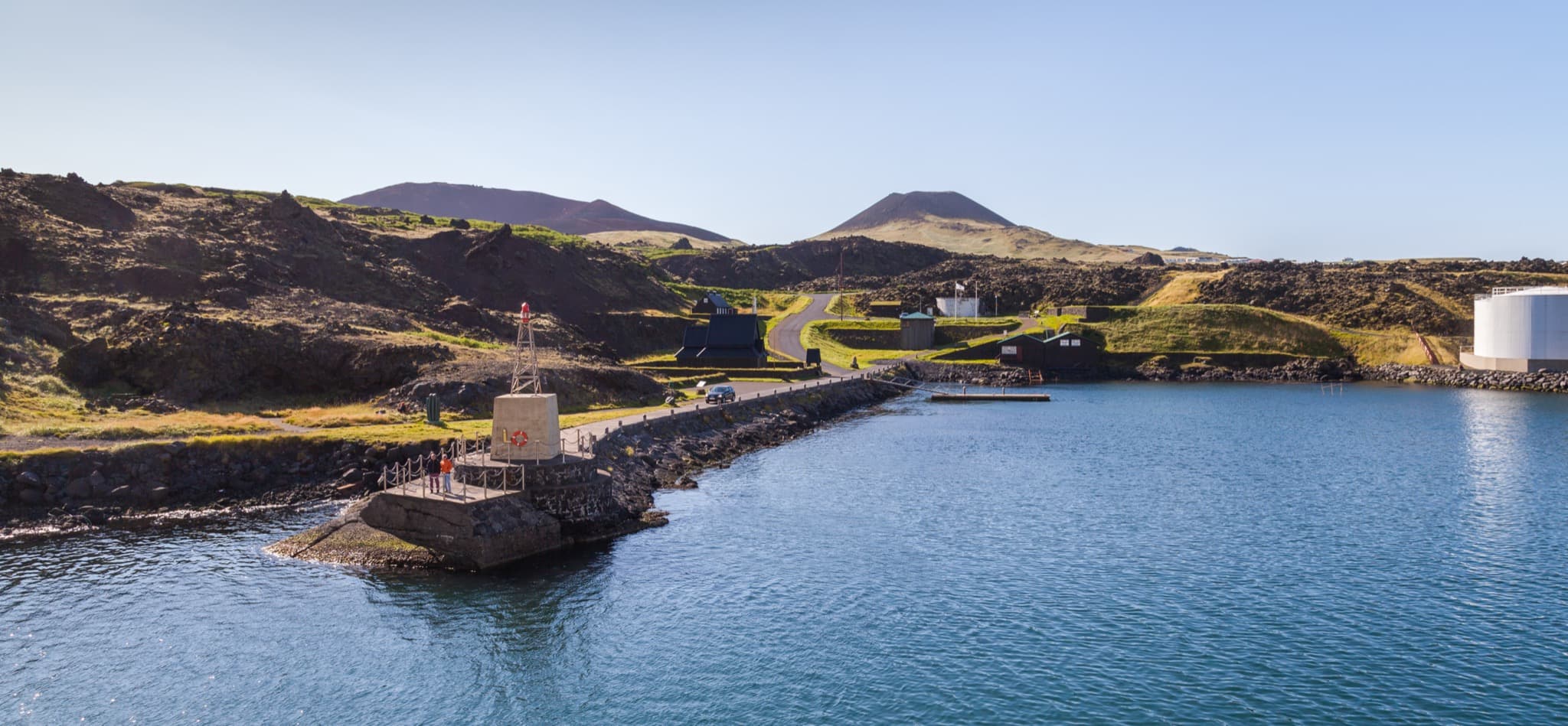 Heimaey harbour and Eldfell volcanic cone in the Westman Islands