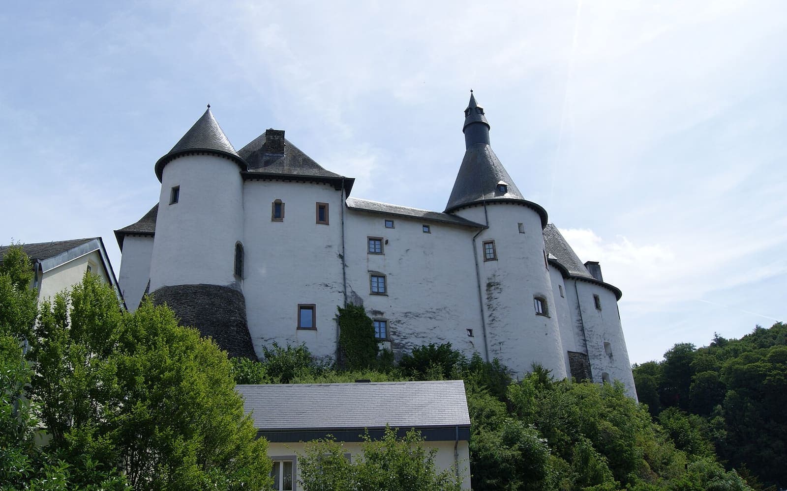 The white walls and towers of Clervaux Castle