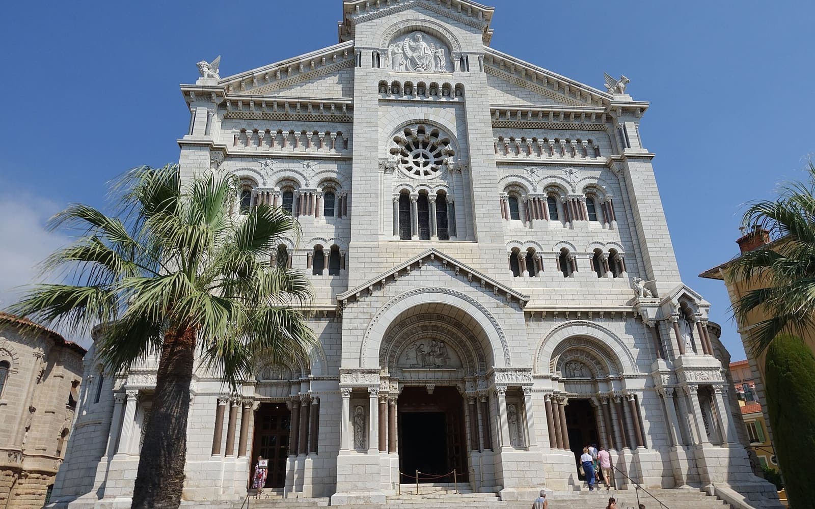 The white Romanesque-revival front of Saint Nicholas Cathedral in Monaco