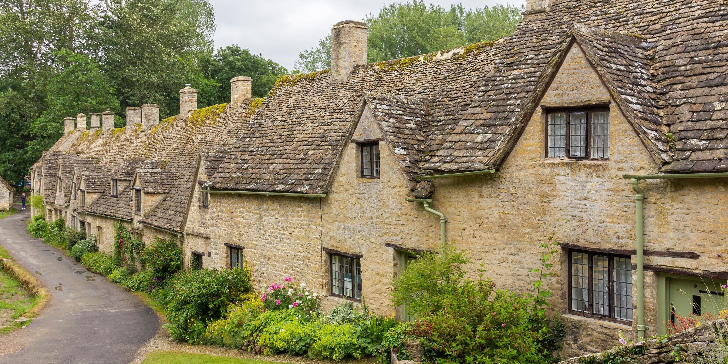 Arlington Row's stone cottages in Bibury, in the Cotswolds